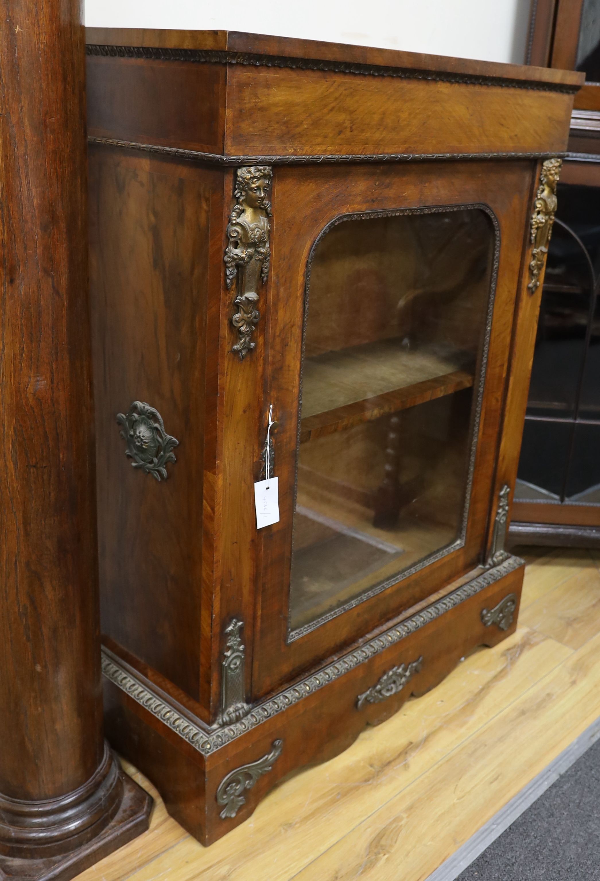 A Victorian gilt metal mounted walnut pier cabinet, width 80cm, depth 32cm, height 112cm